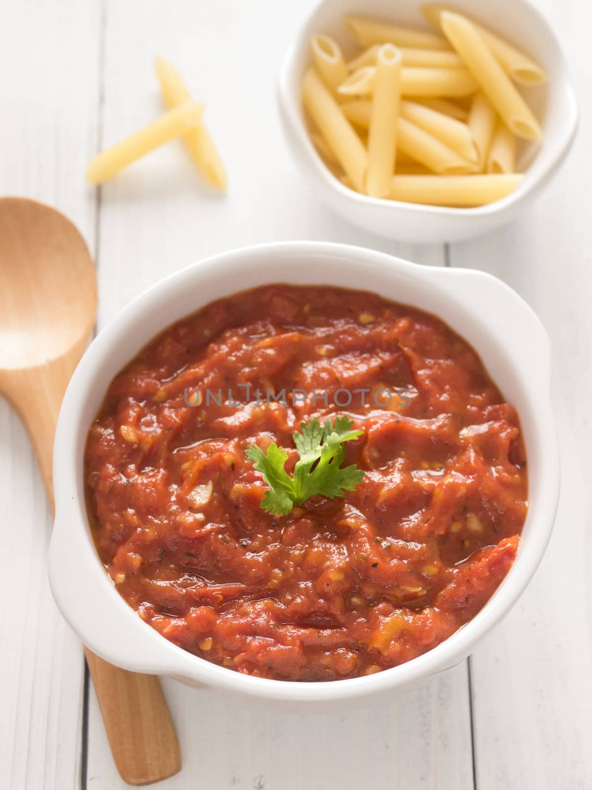 close up of a bowl of tomato sauce