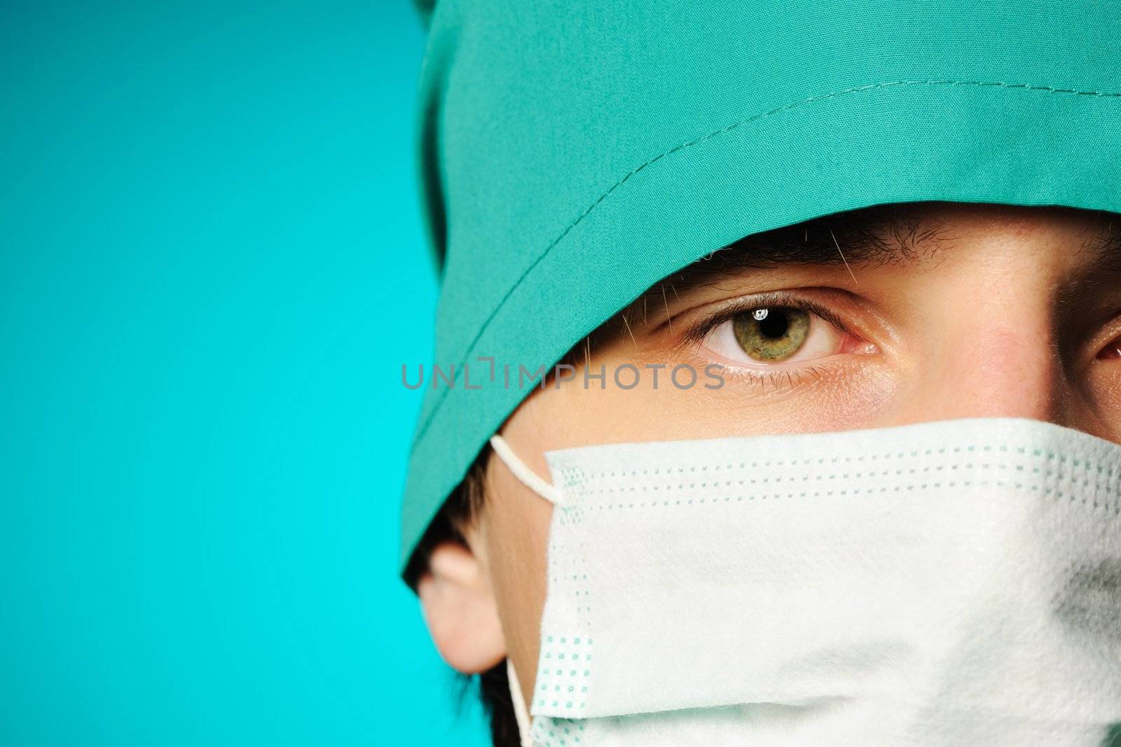 Surgeon in mask close-up portrait