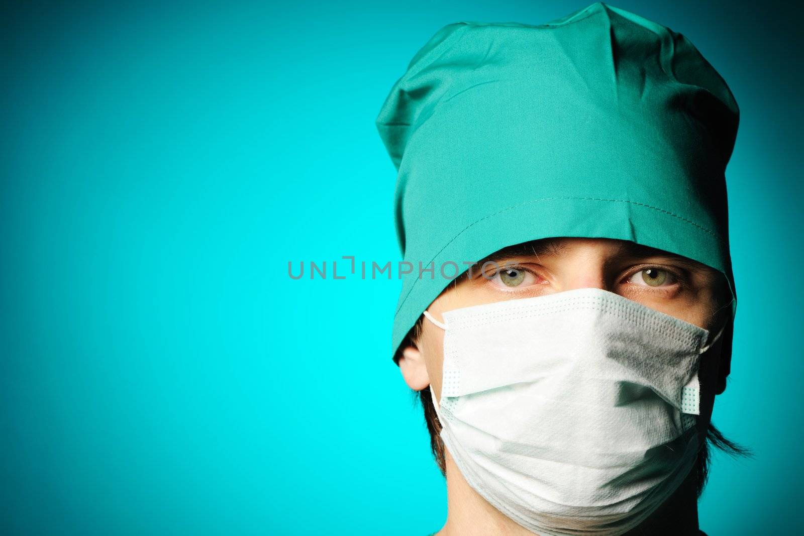 Surgeon in mask close-up portrait