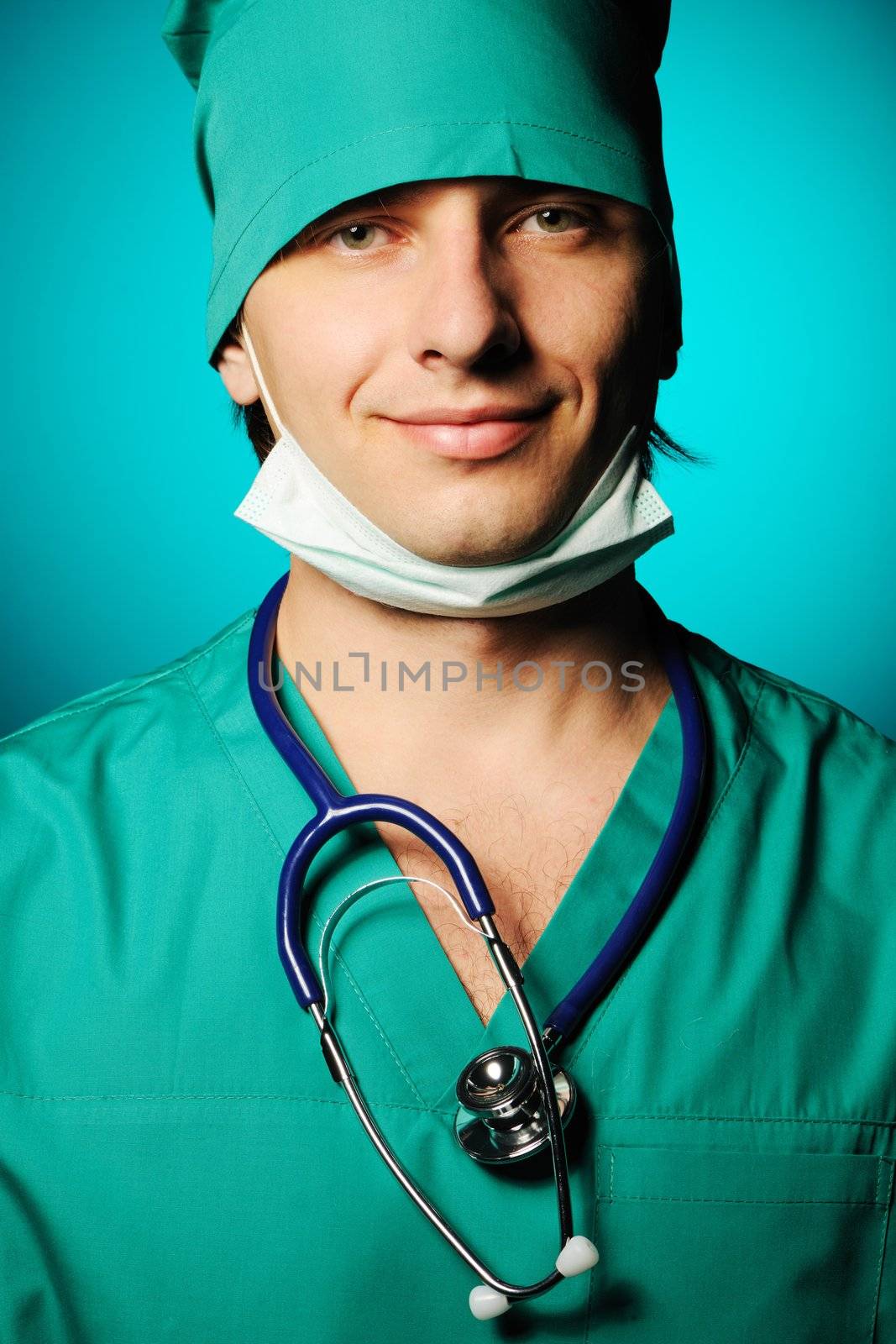 Surgeon with stethoscope over blue background