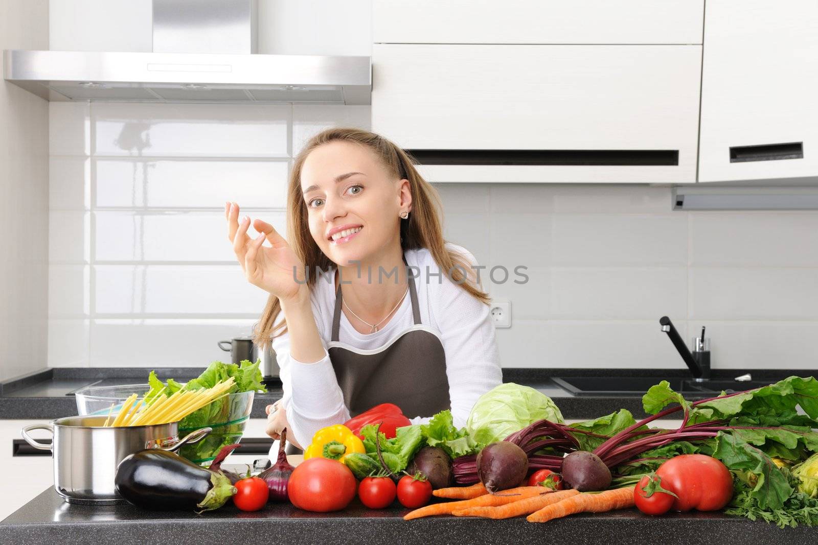 Woman cooking in modern kitchen