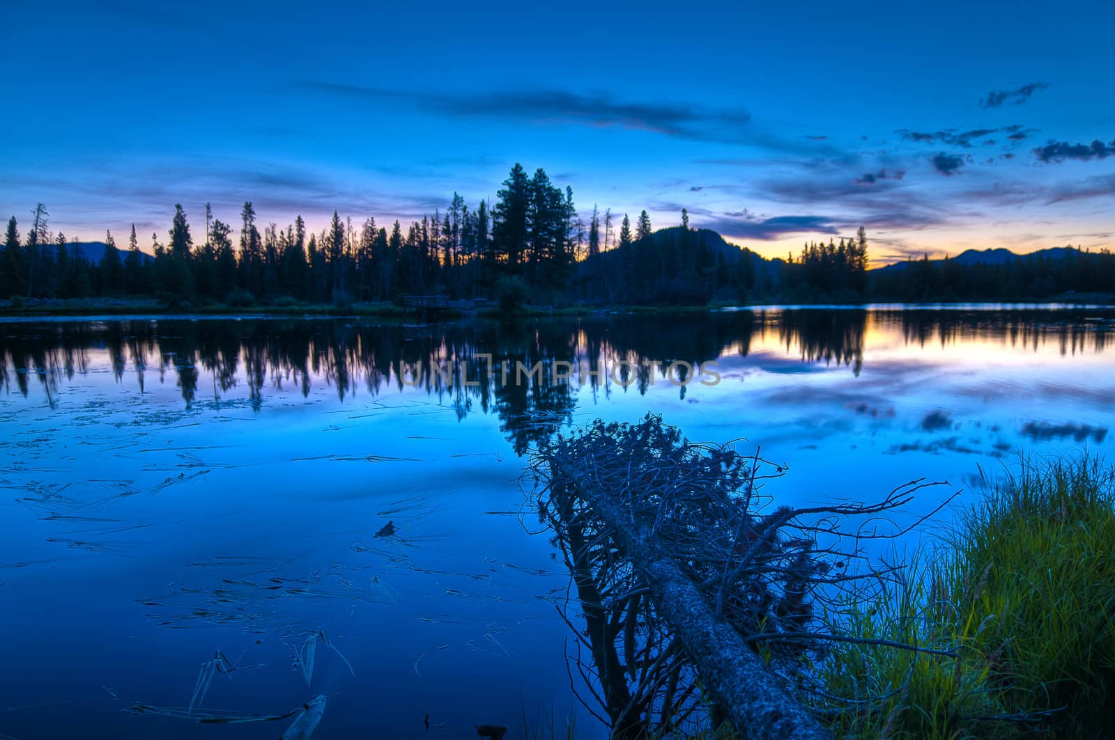 Calm serene Spraque Lake early morning - Rocky Mountains 