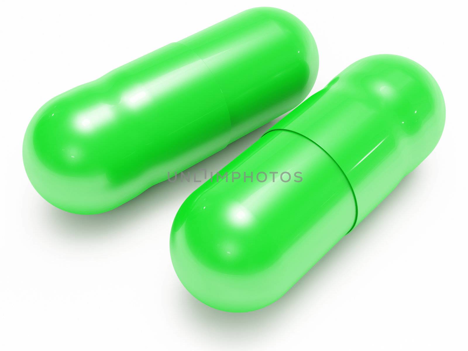 Two shiny green pills (medical capsules) by maxkabakov
