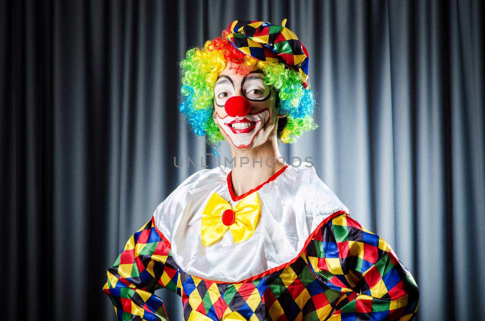 Funny clown in the studio shooting by Elnur