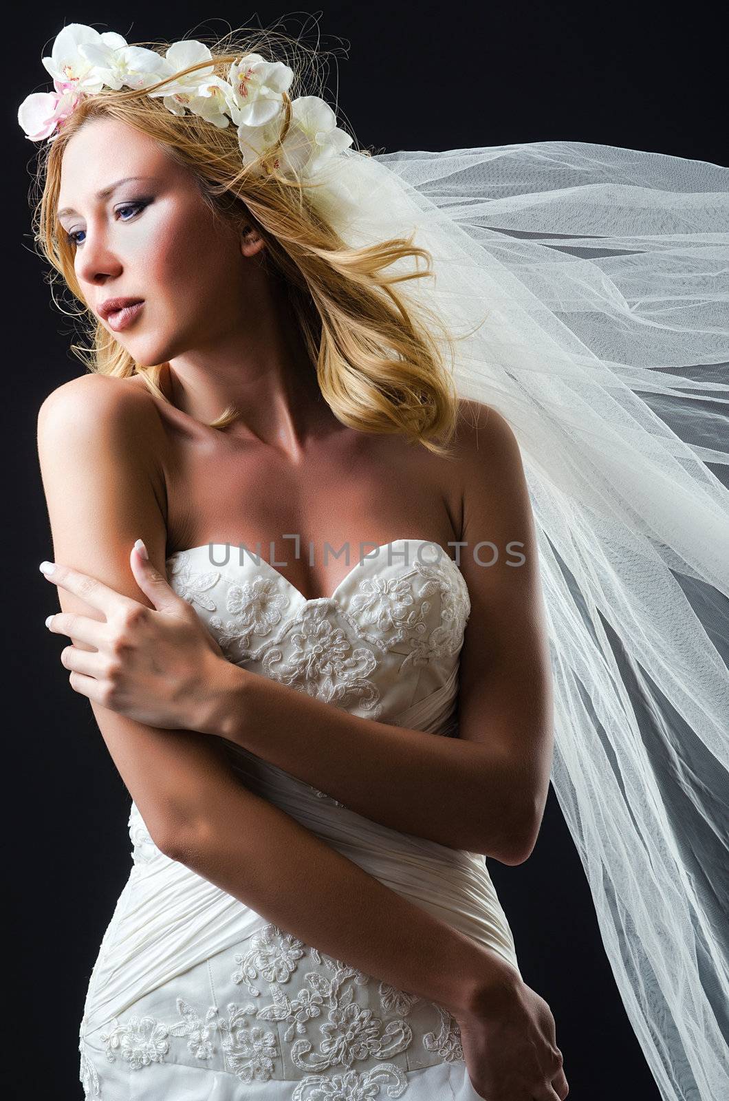 Bride in white dress in studio