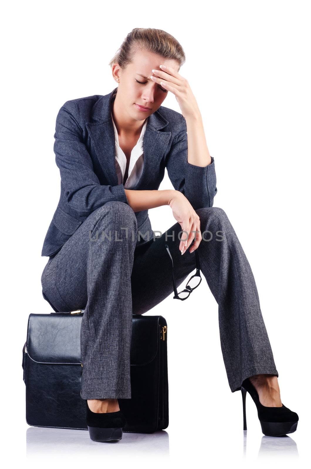 Young woman with briefcase on white