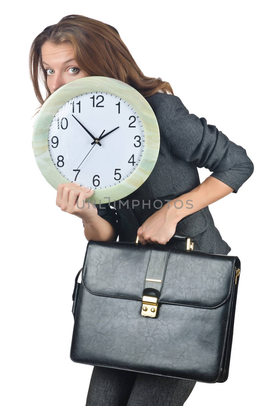 Businesswoman with clock isolated on white