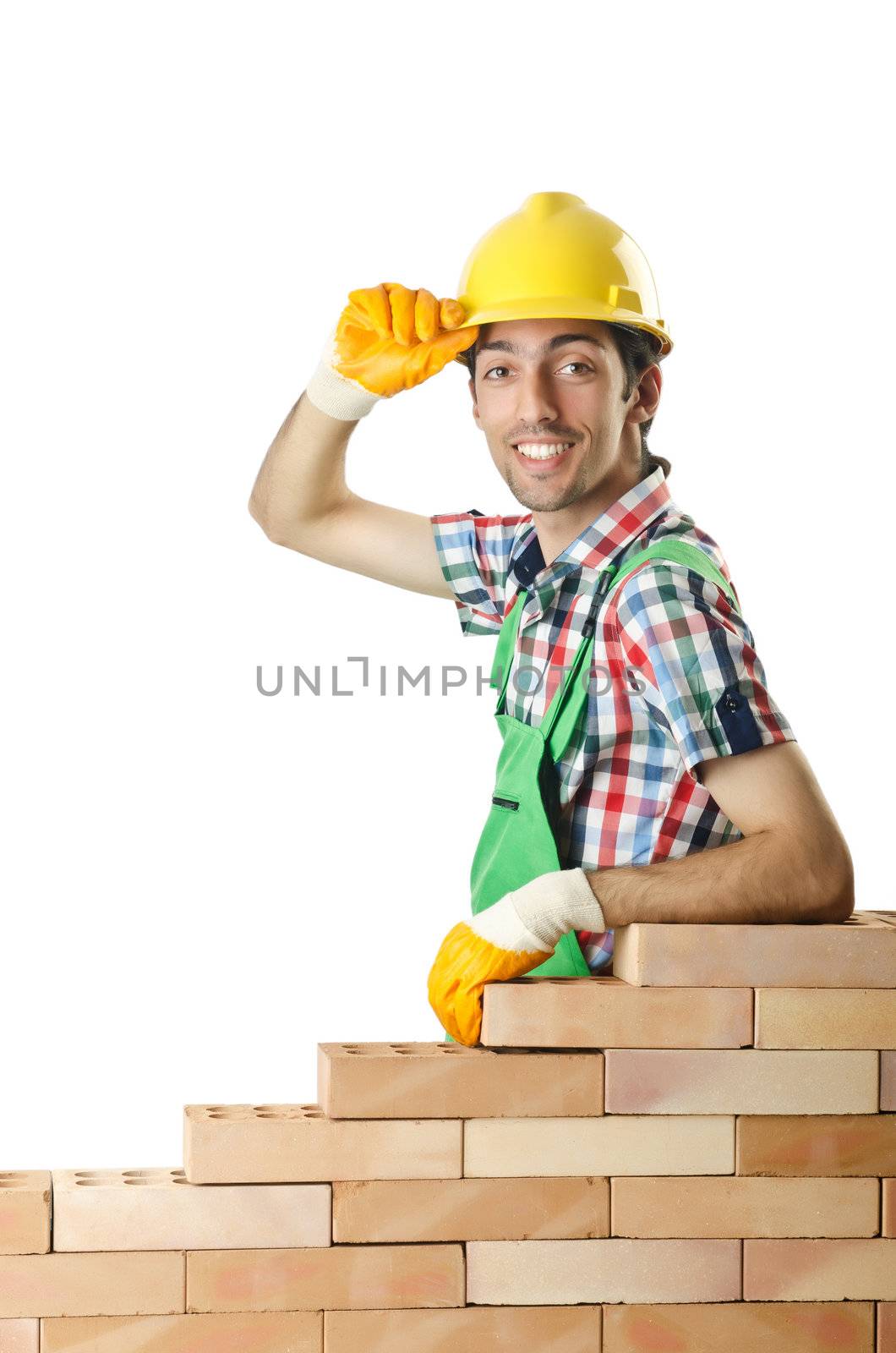 Builder with hard hat on white