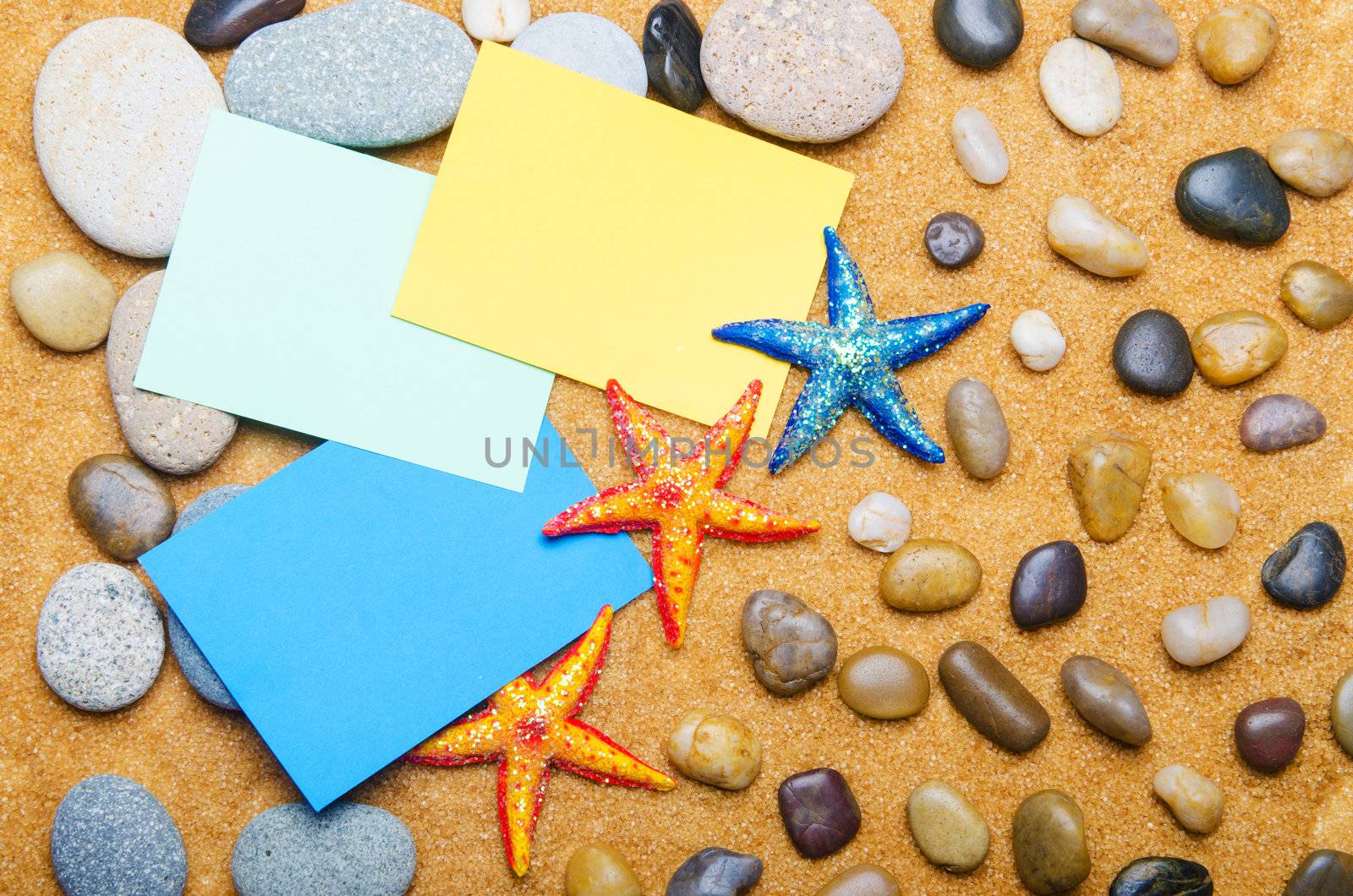 Blank message on sand and pebbles