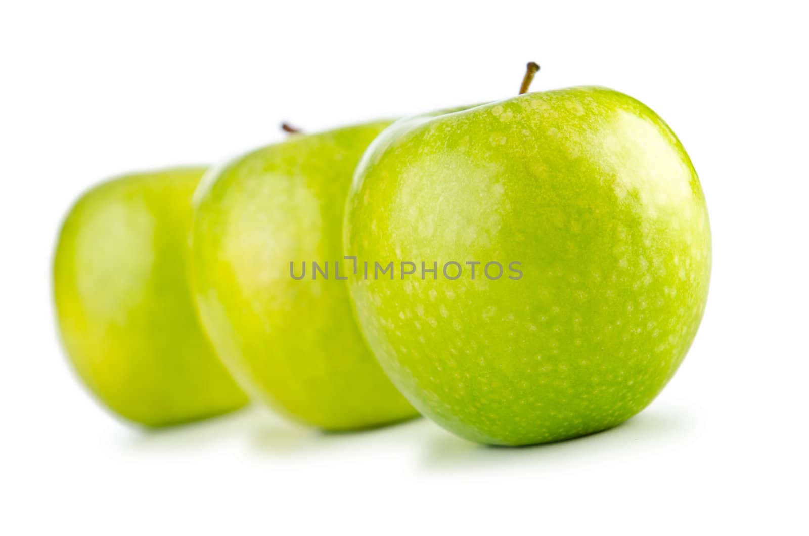 Green apples isolated on the white background by Elnur