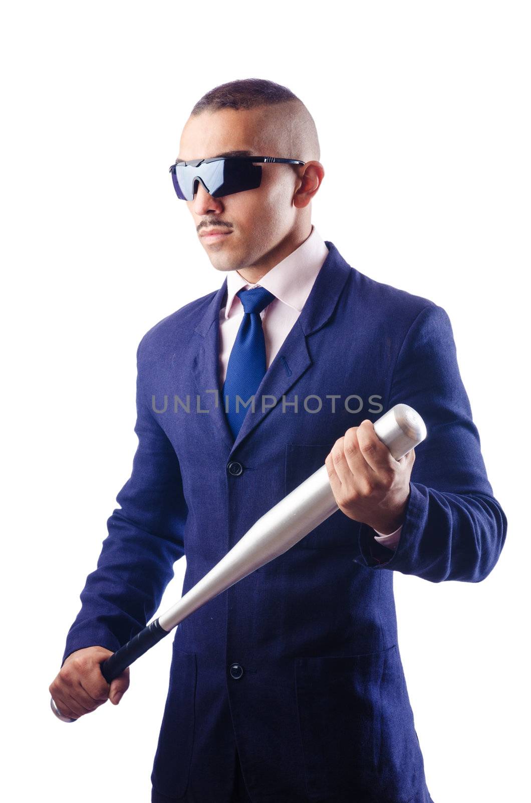 Handsome businessman with bat on white