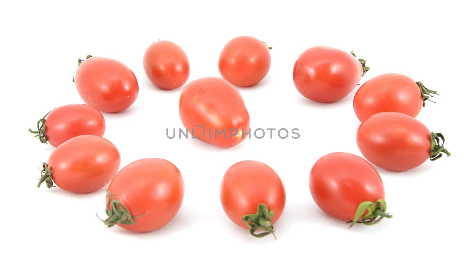 red ripe tomatoes on white background