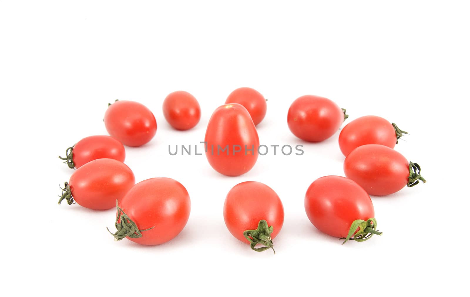 red ripe tomatoes on white background