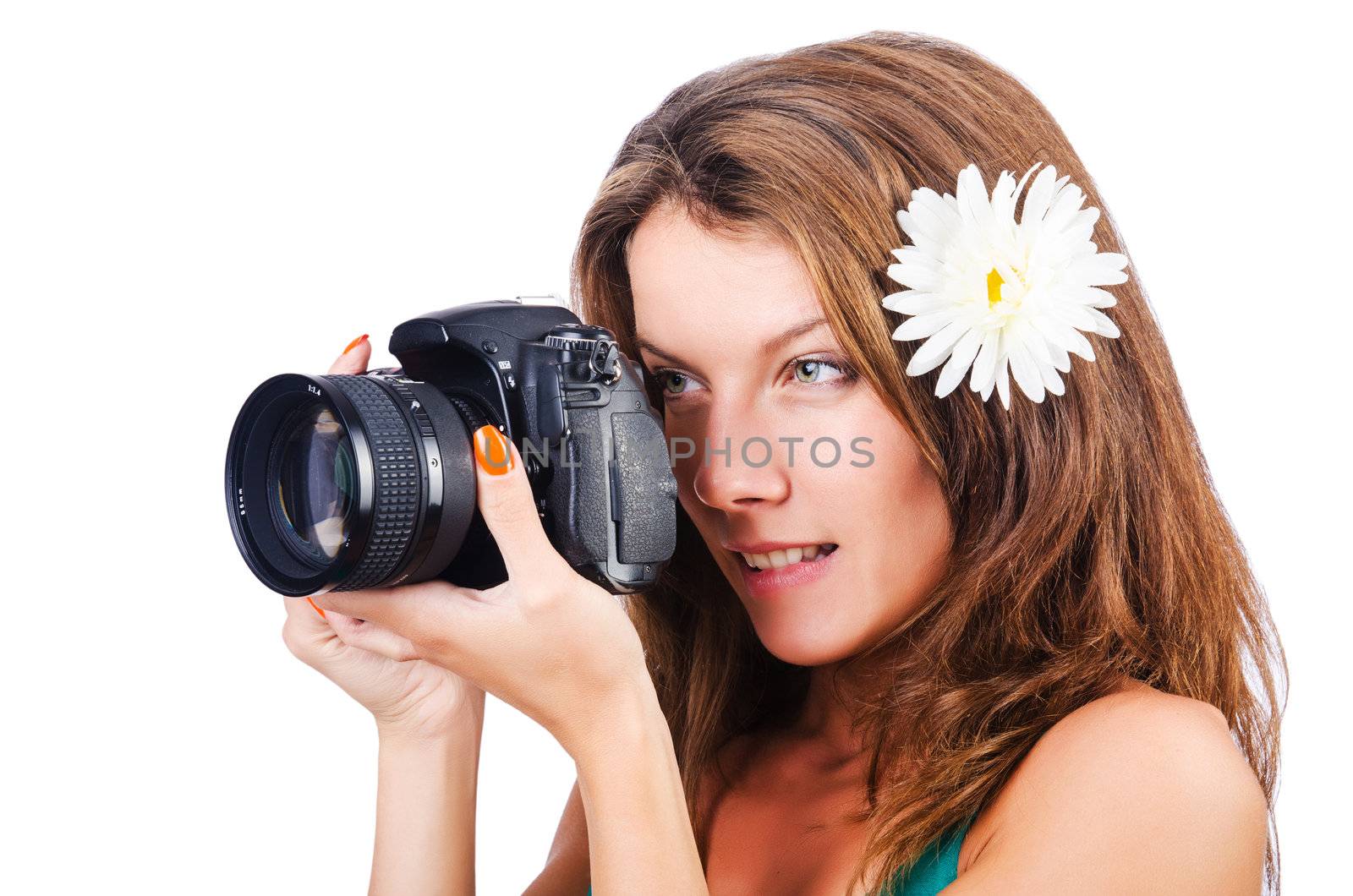 Attractive female photographer on white
