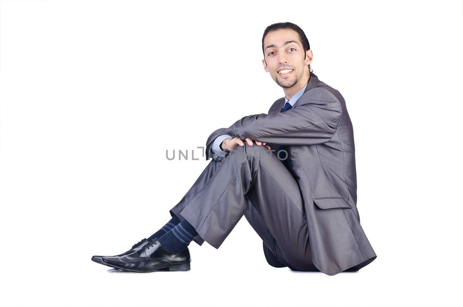 Businessman isolated on the white background by Elnur