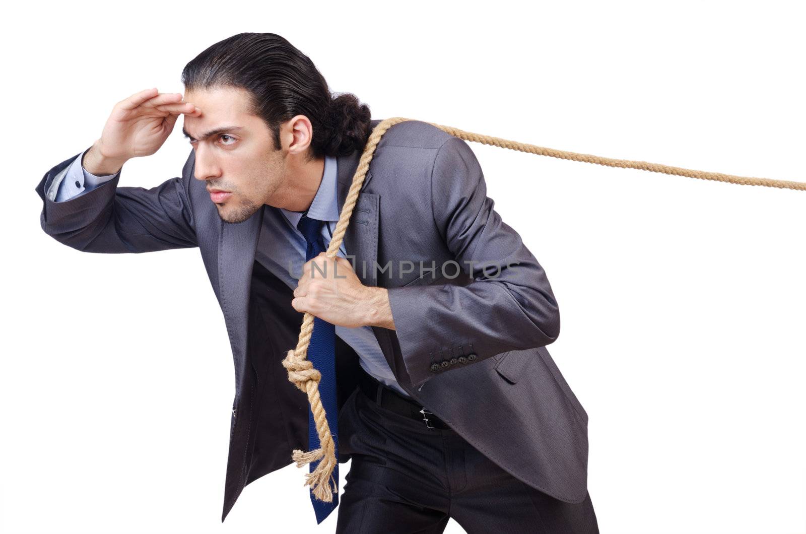 Businessman pulling rope on white