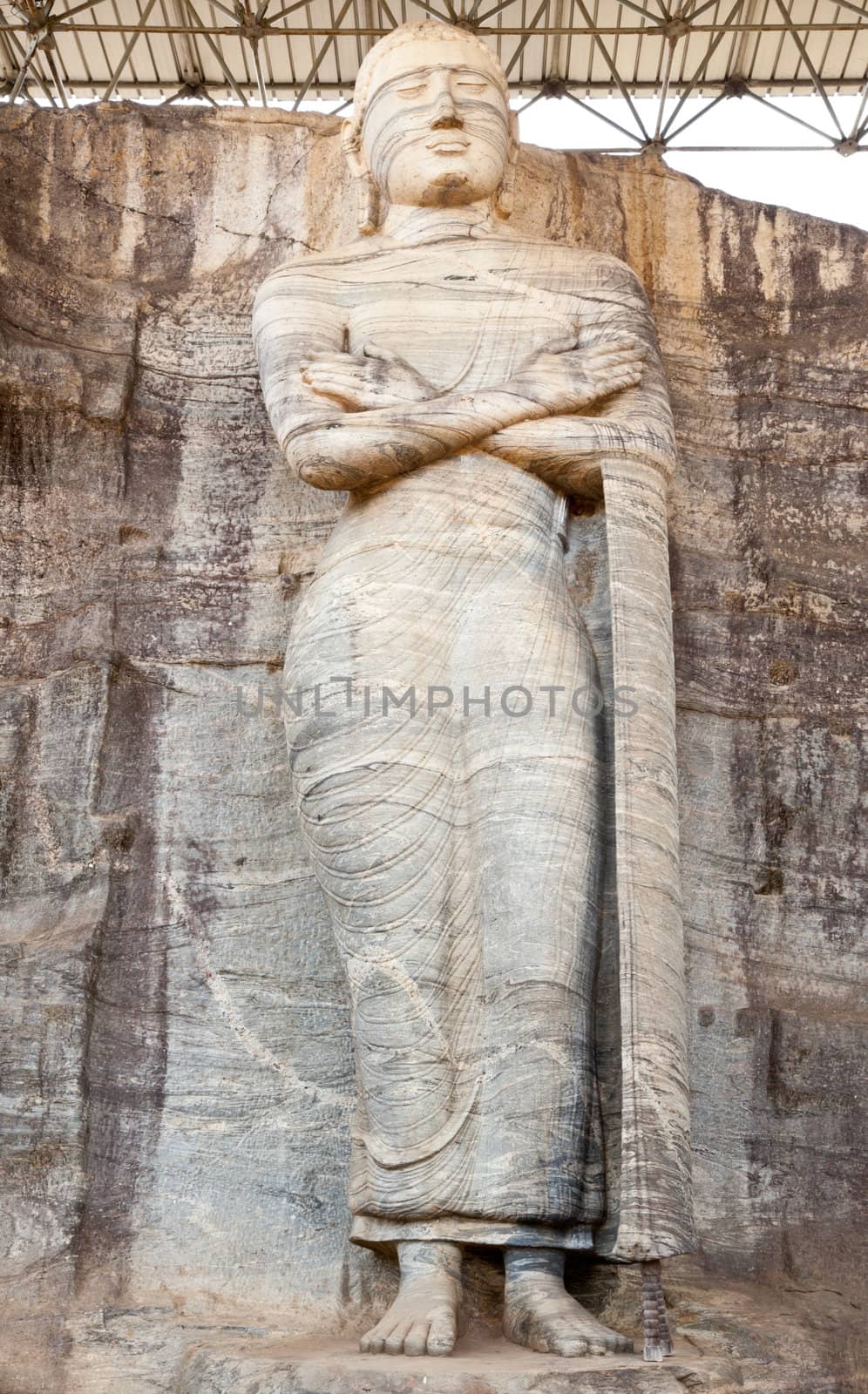 ancient carving buddha statue in polonnaruwa, sri lanka
