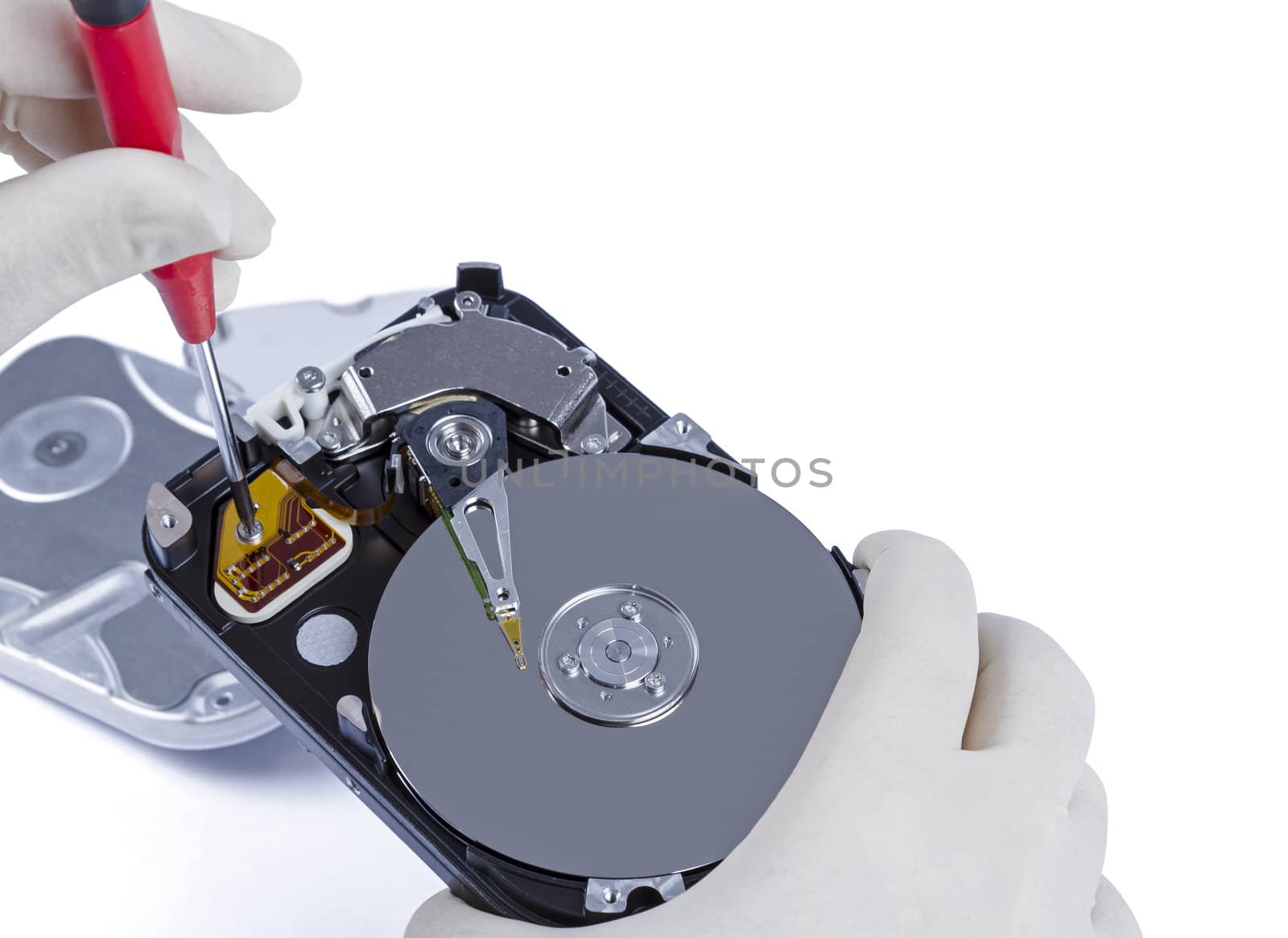 technician with open hard-disk by gewoldi