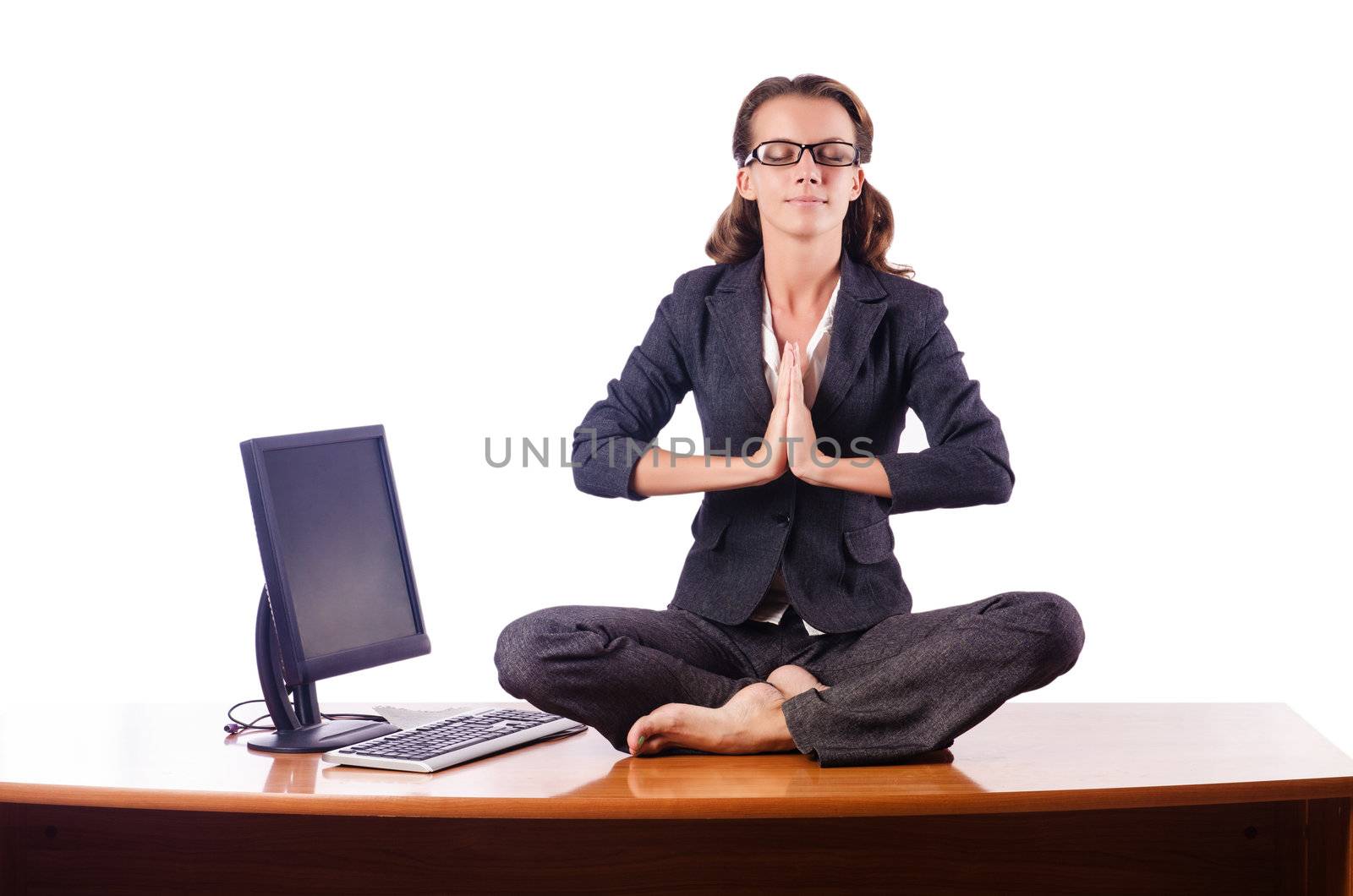 Woman meditating on the desk