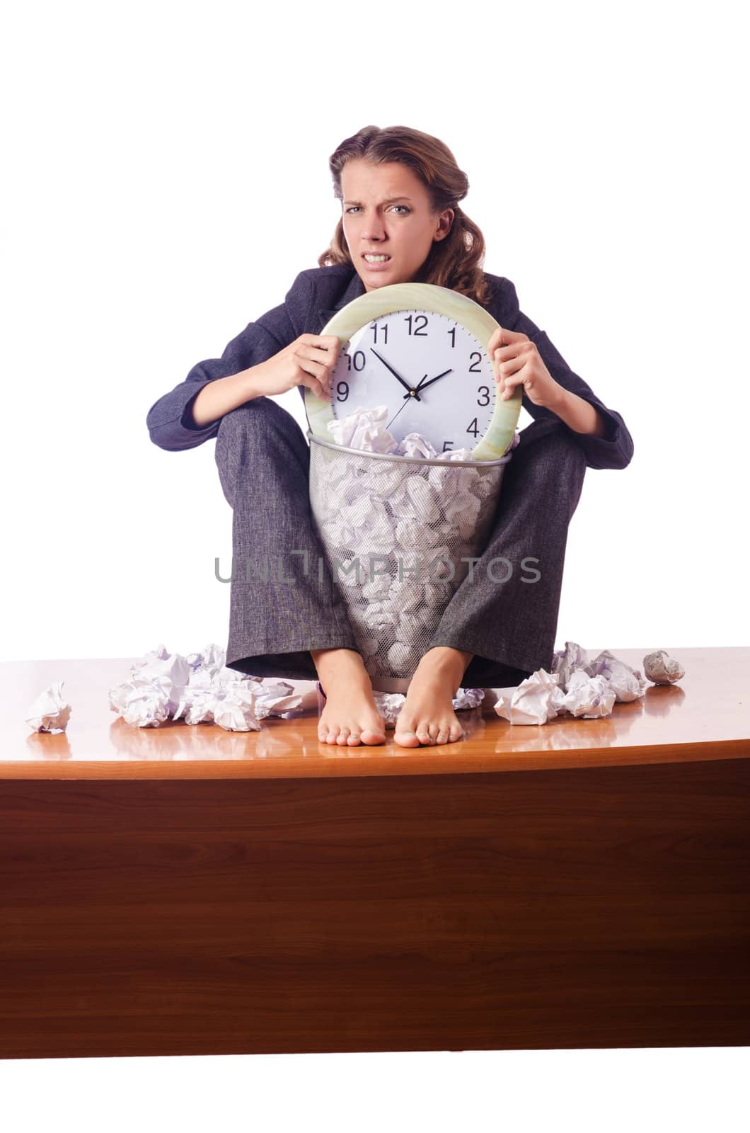 Woman with lots of discarded paper