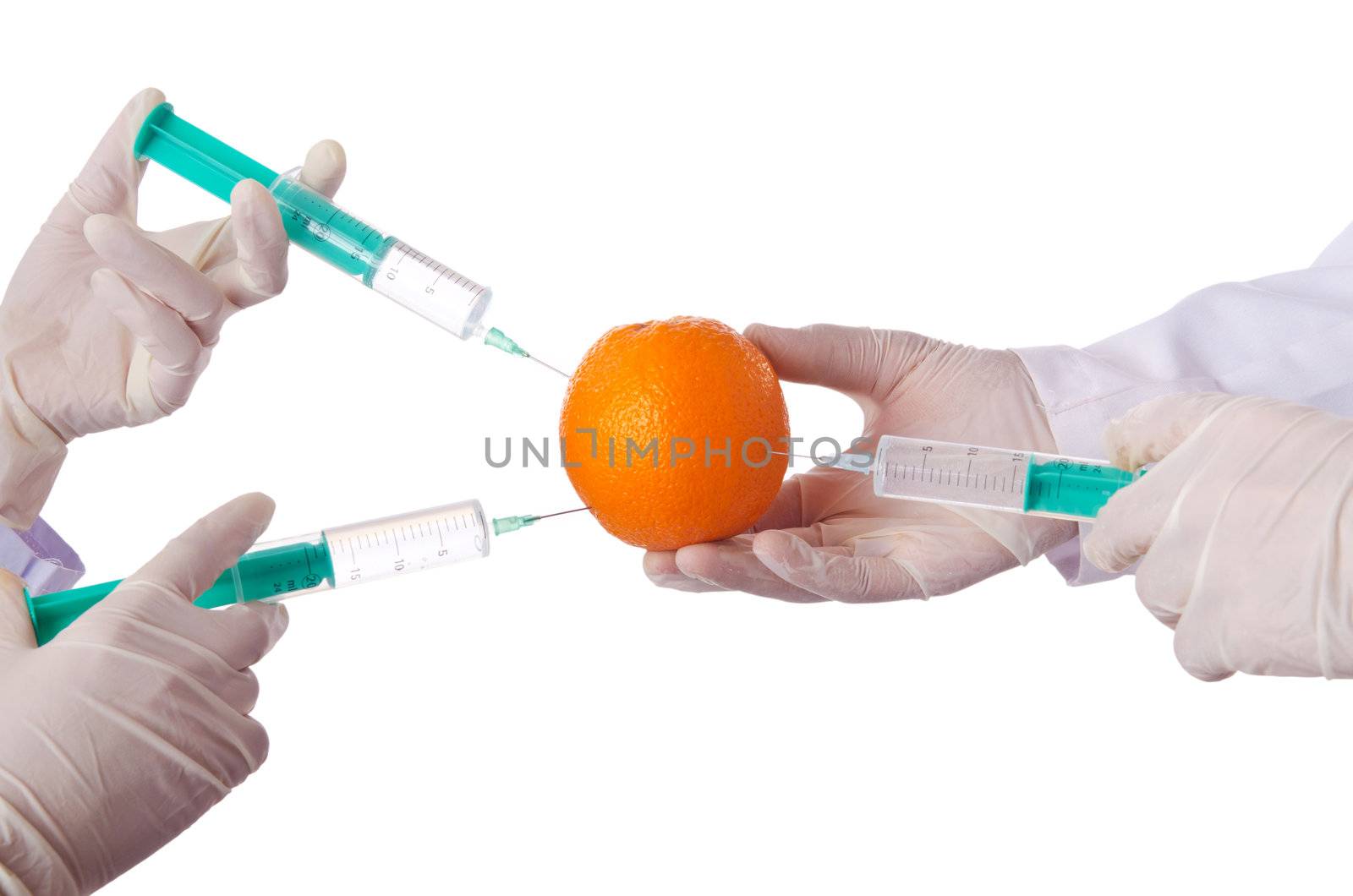 Science experiment with orange and syringe