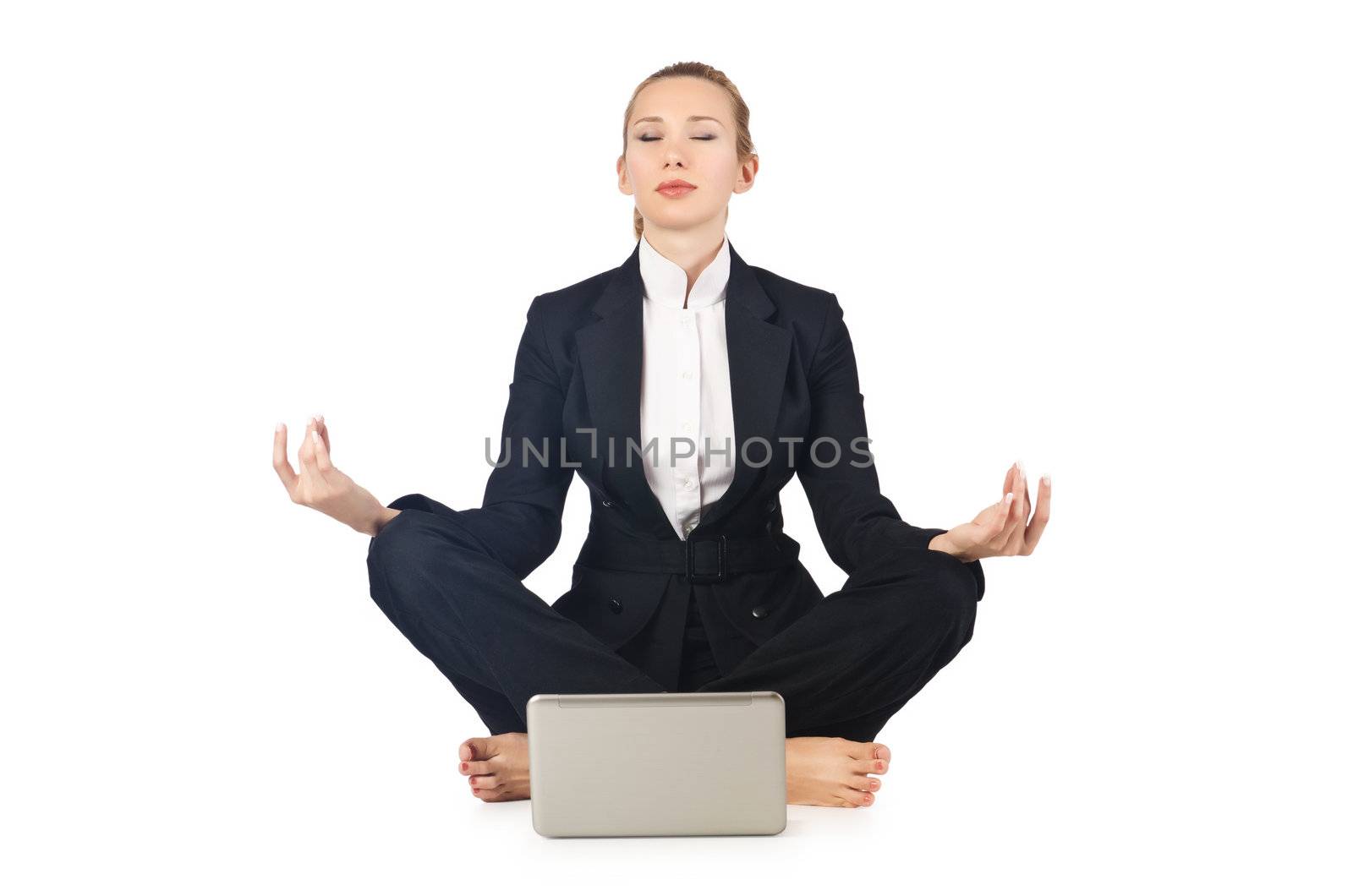 Young businesswoman meditating on the white