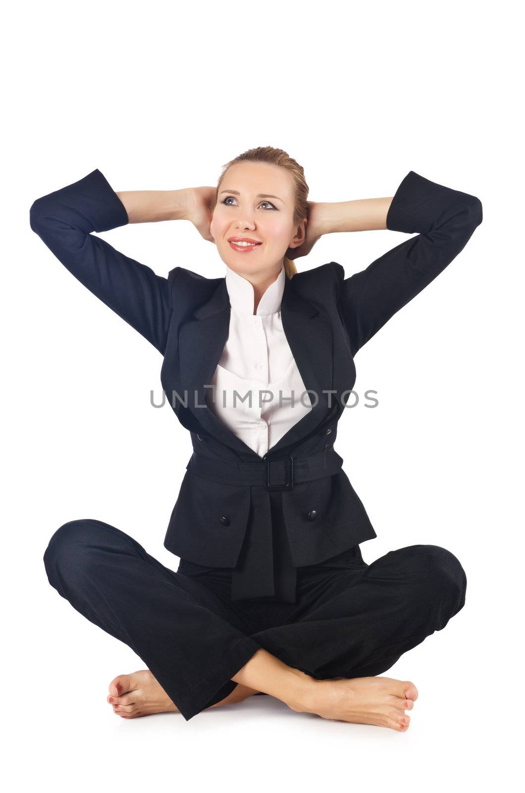 Young businesswoman meditating on the white