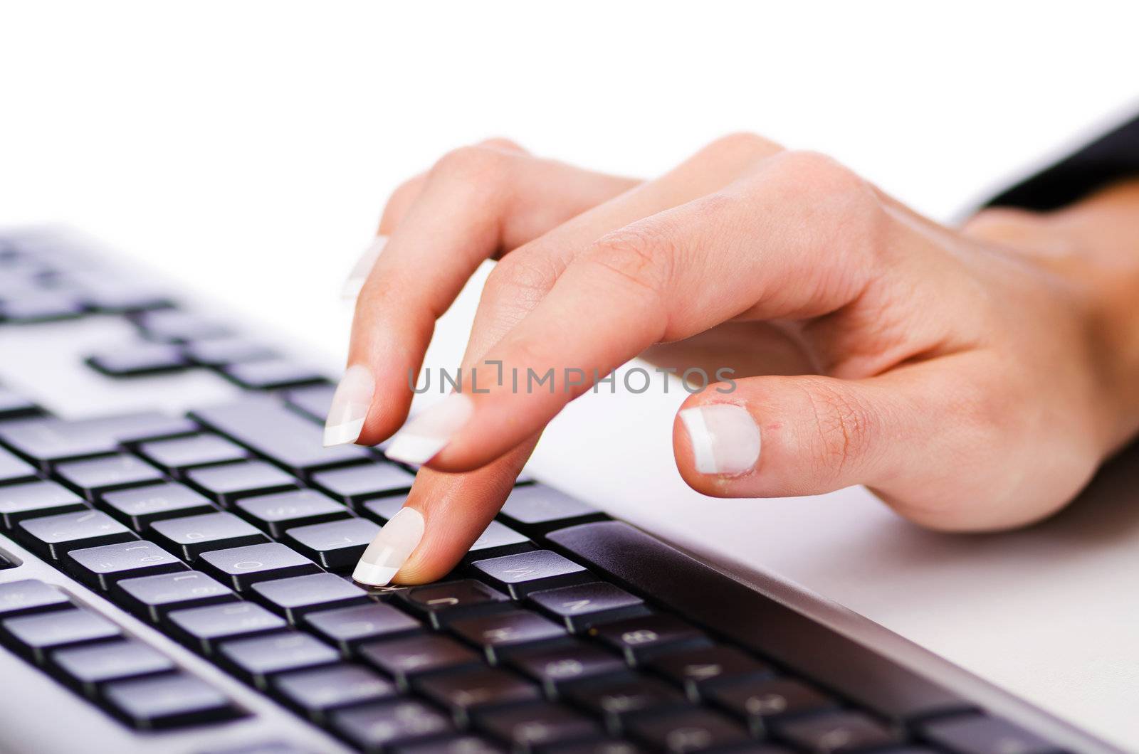 Hands working on the keyboard