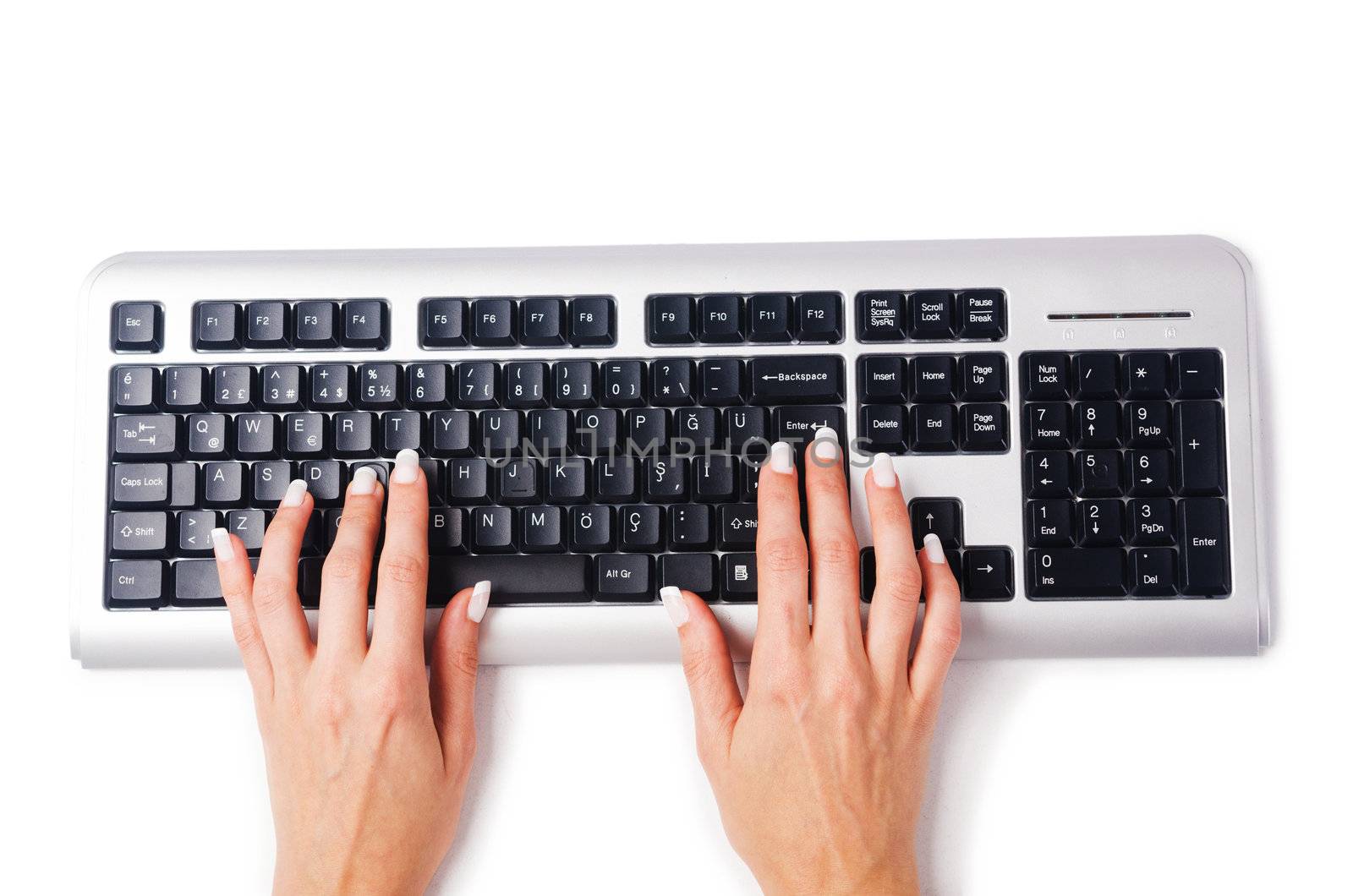 Hands working on the keyboard