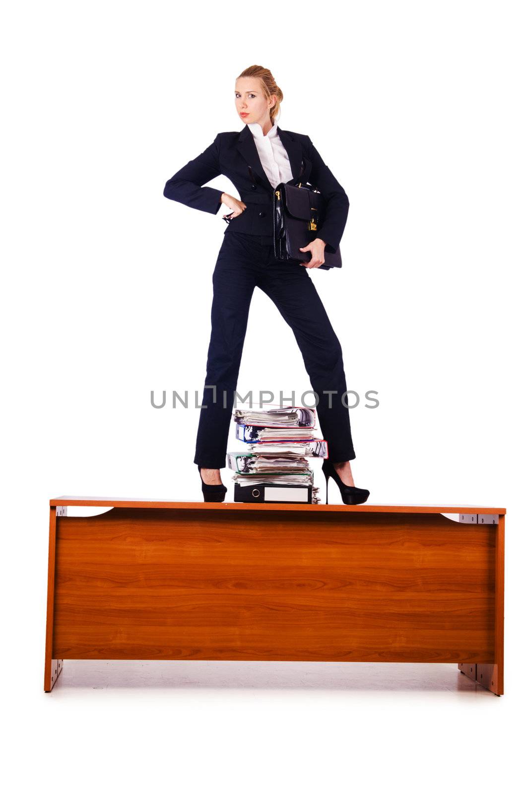 Dominant woman boss standing on desk