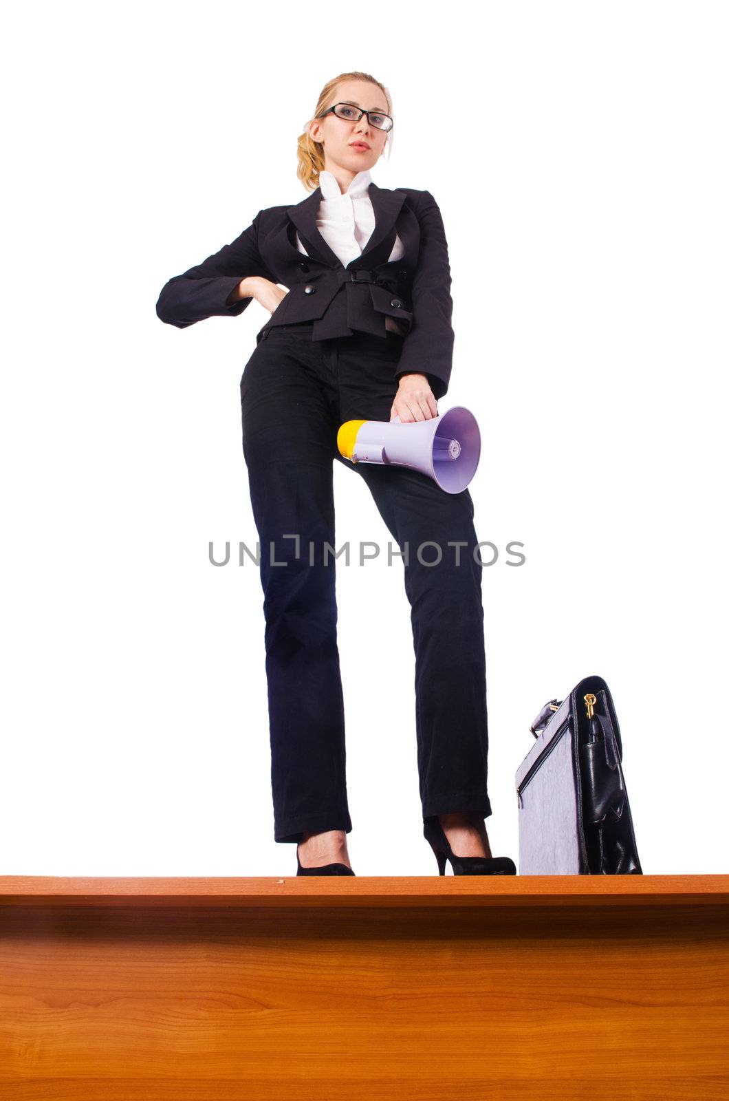 Businesswoman shouting through loudspeaker