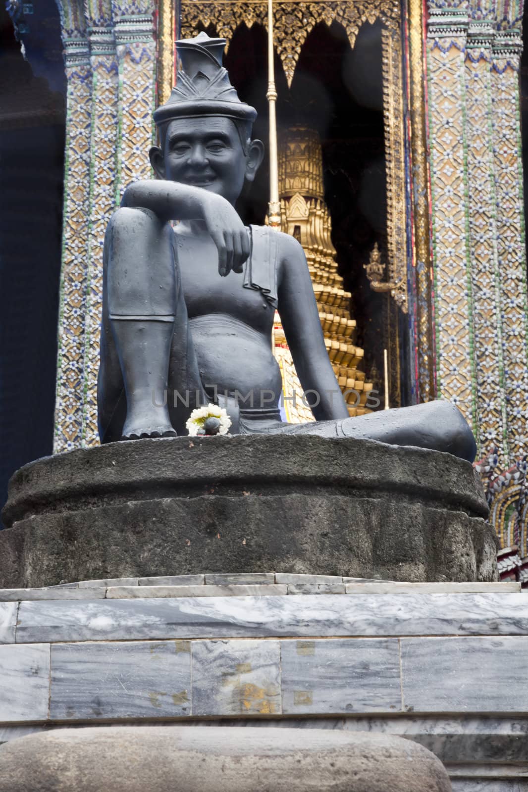 statue of hermit in front of wat phra kaew, bangkok, thailand