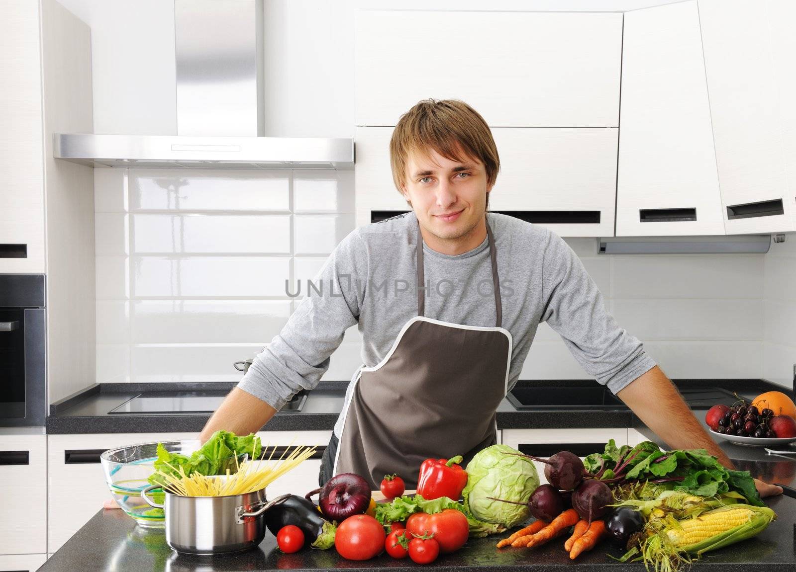 Man cooking in modern kitchen