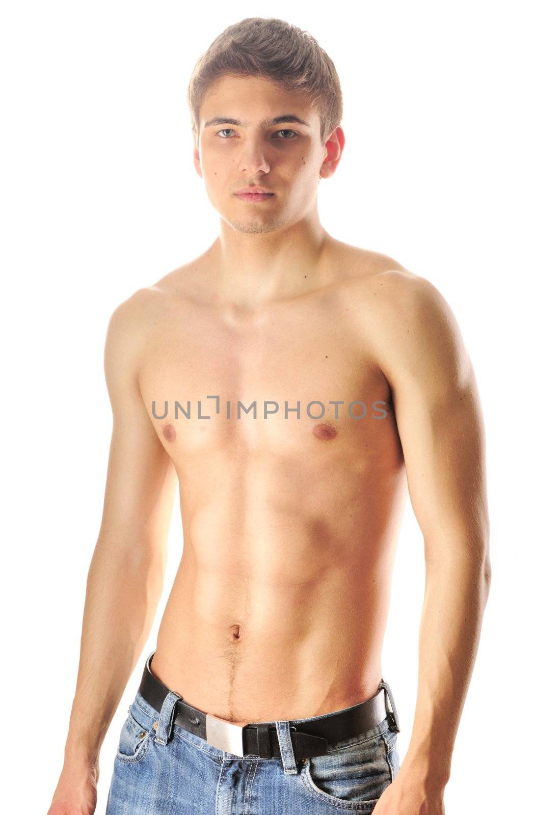 Man with muscular torso over white