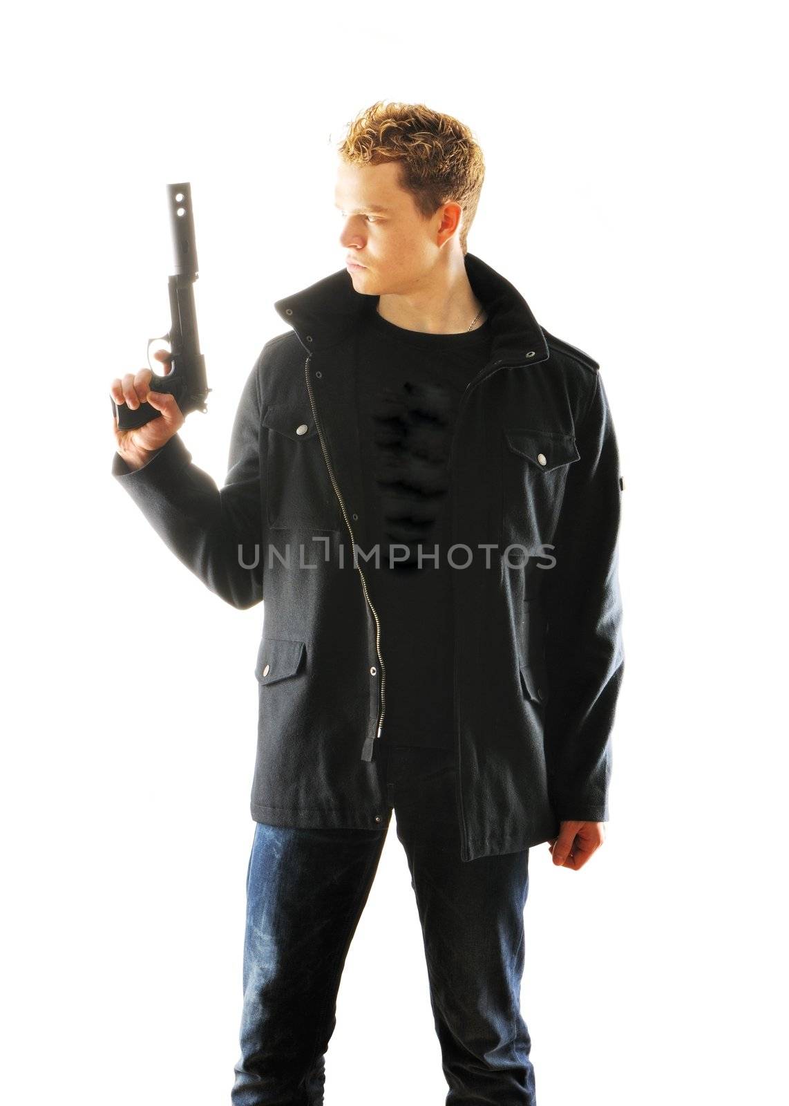 Man holding gun with silencer over white