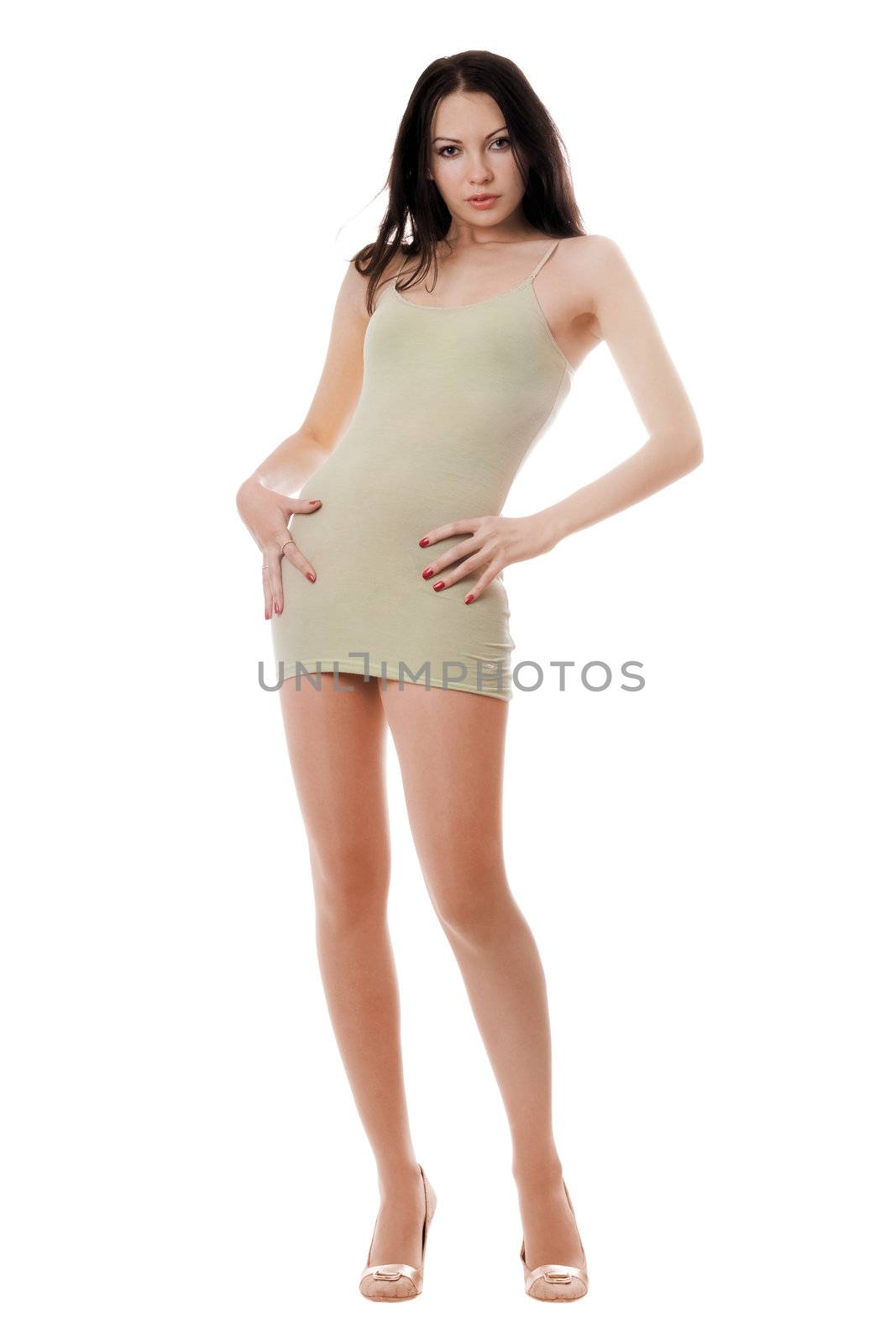 Young playful woman posing in tight-fitting olive dress. Isolated