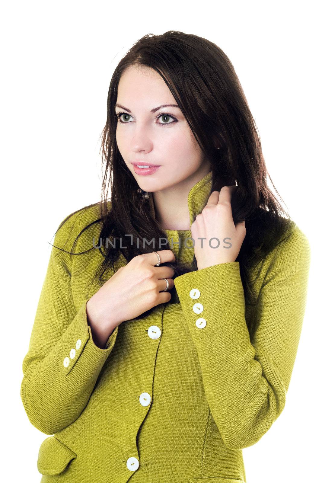 Portrait of pretty woman in yellow knitted jacket. Isolated