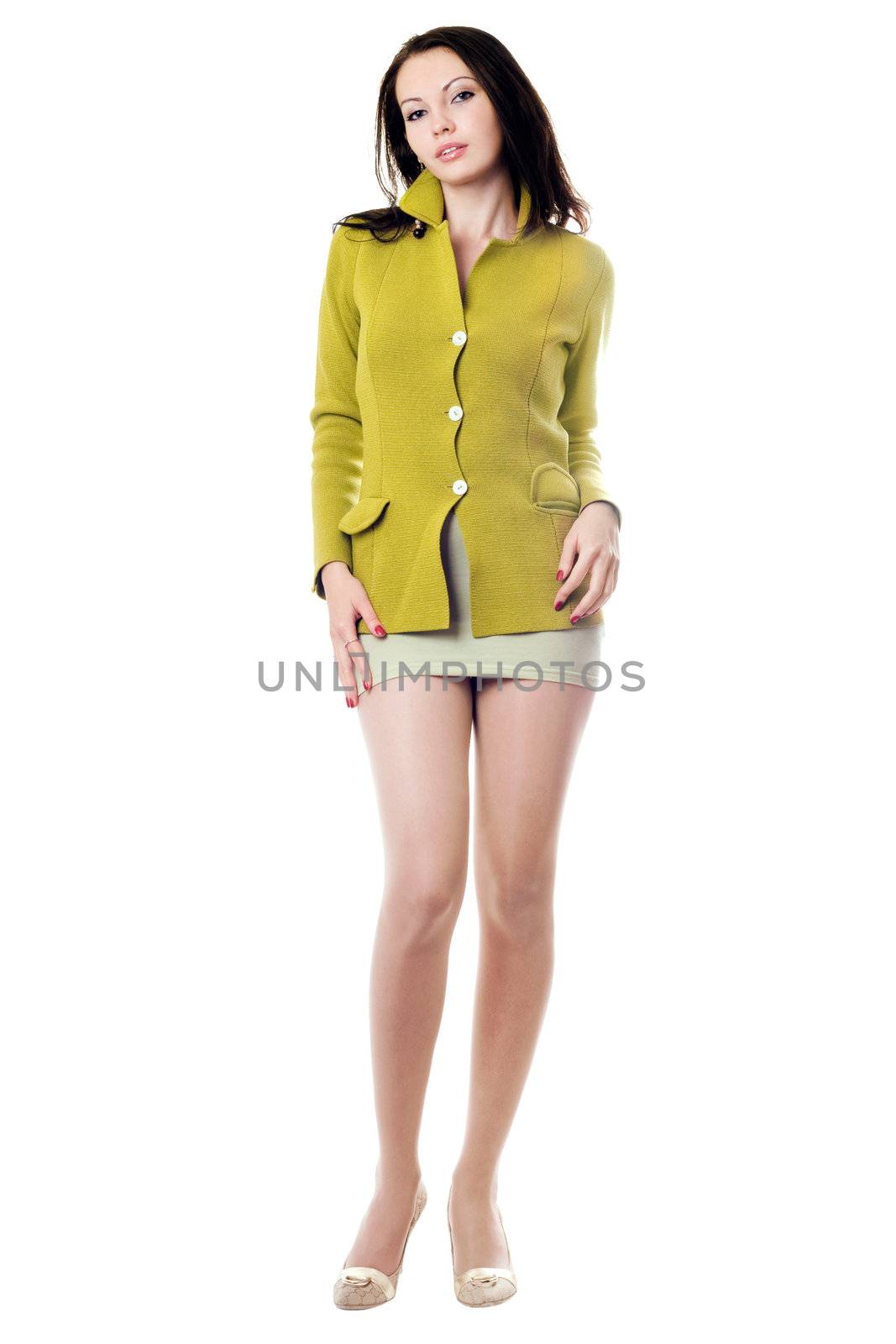 Young pretty woman in yellow knitted jacket. Isolated