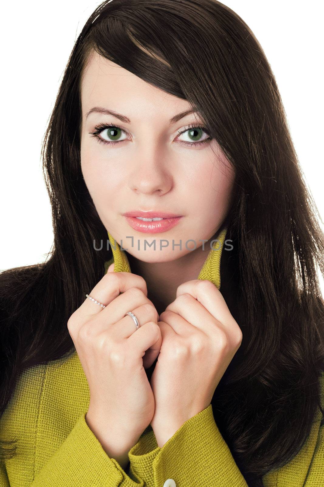 Close-up of pretty woman in yellow knitted jacket. Isolated