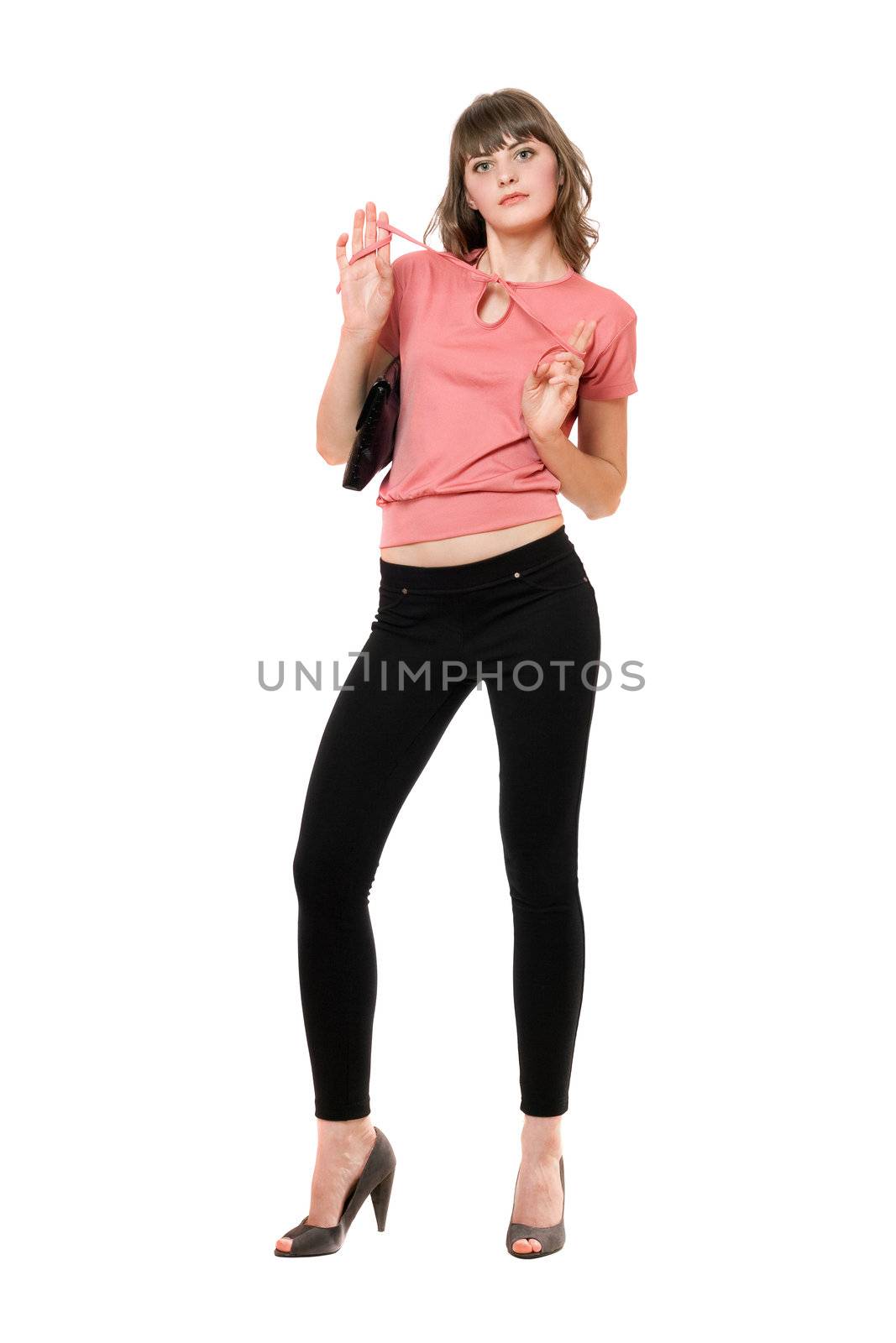 Young charming woman in a black leggings. Isolated