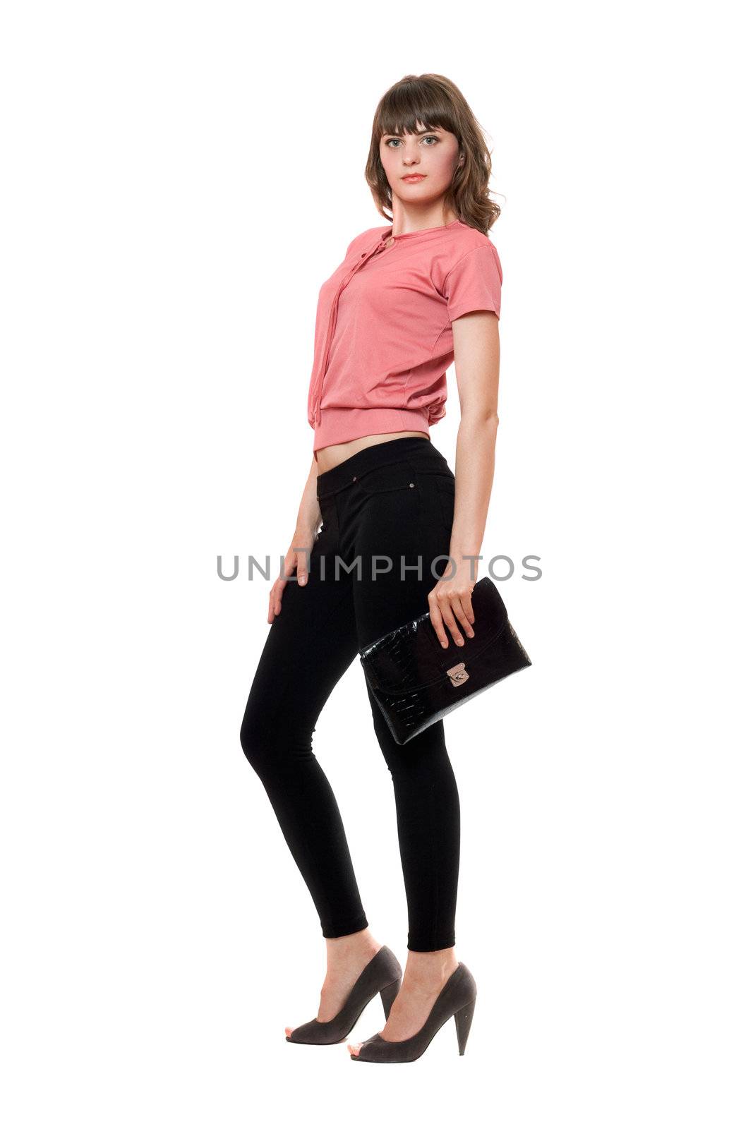 Young woman in a black leggings. Isolated on white