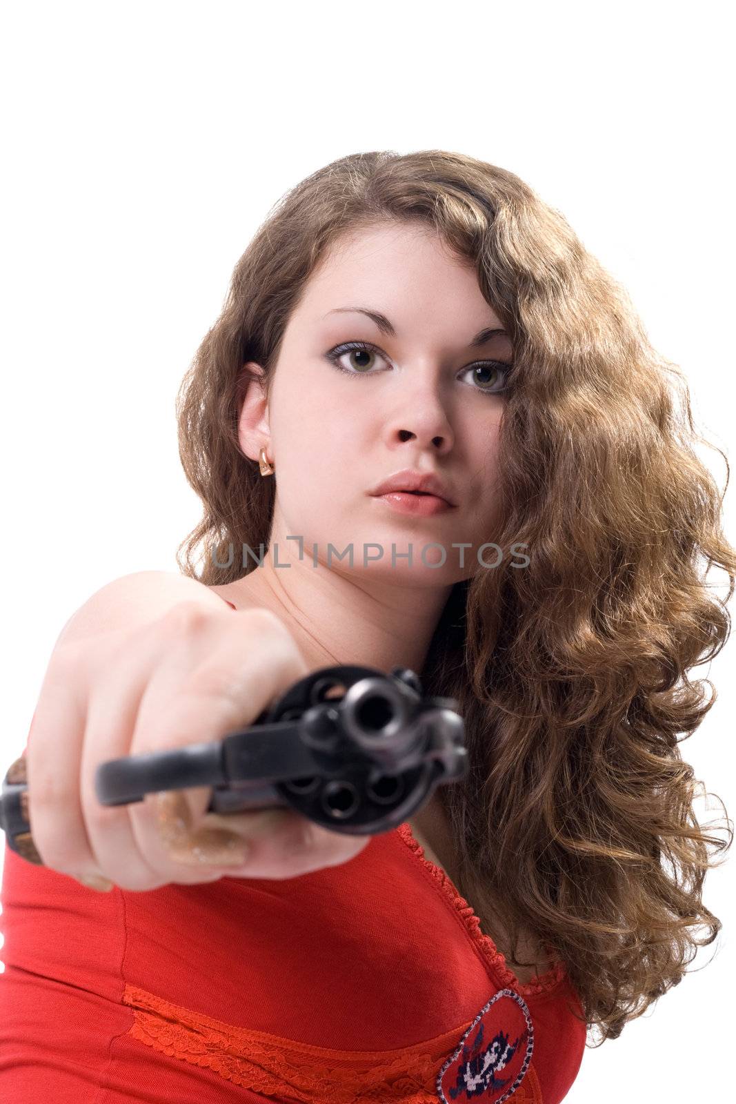 Young woman with a revolver. Isolated on white