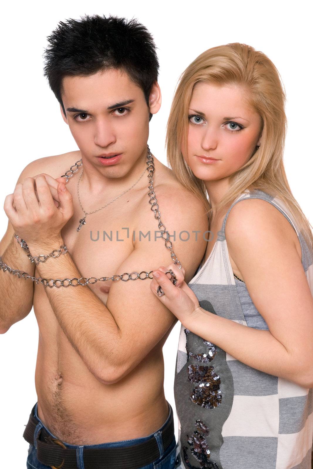 Beautiful young woman and a guy in chains