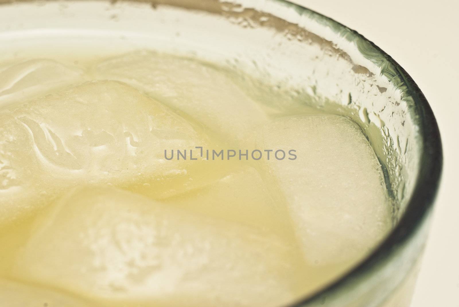 close-up of a cocktail with ice by gandolfocannatella