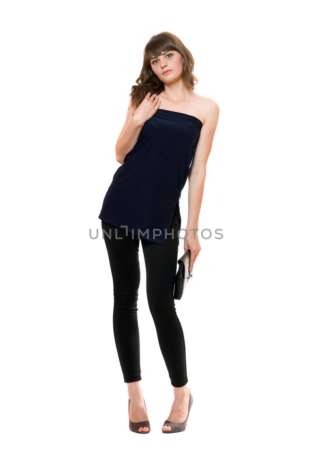 Beautiful girl in a black leggings. Isolated on white