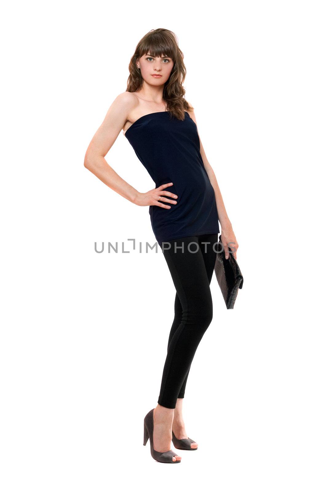 Pretty girl in black leggings with a handbag. Isolated