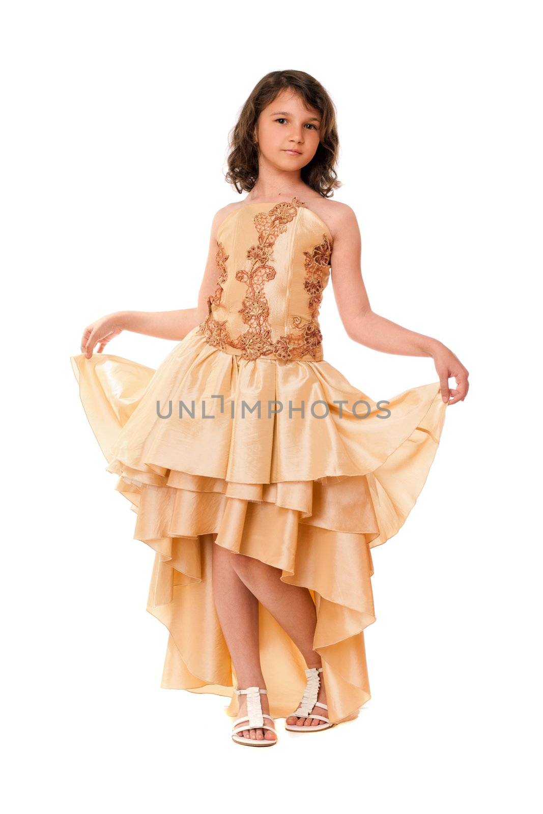 Little girl in a chic evening dress. Isolated