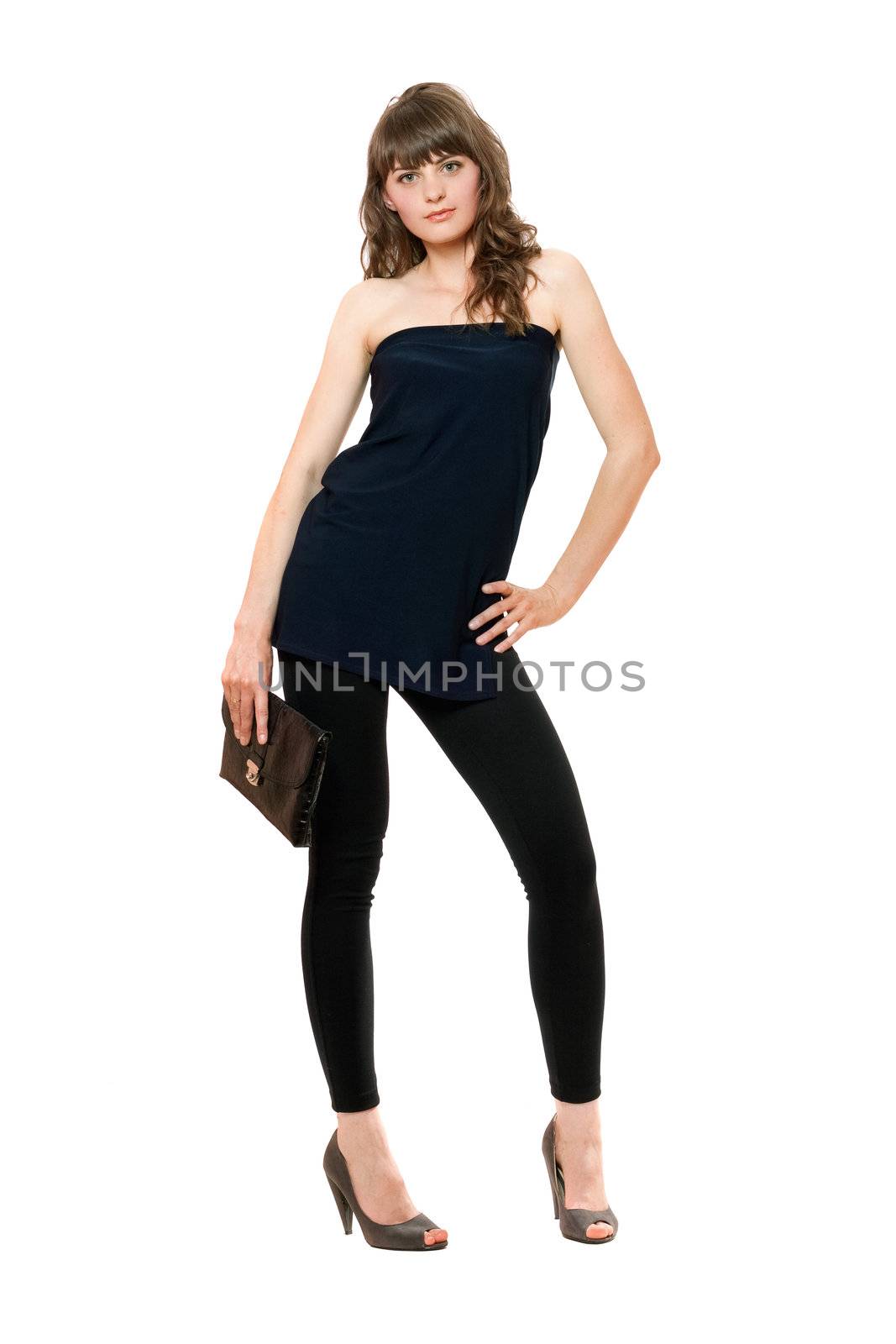 Pretty young woman in black leggings with a handbag