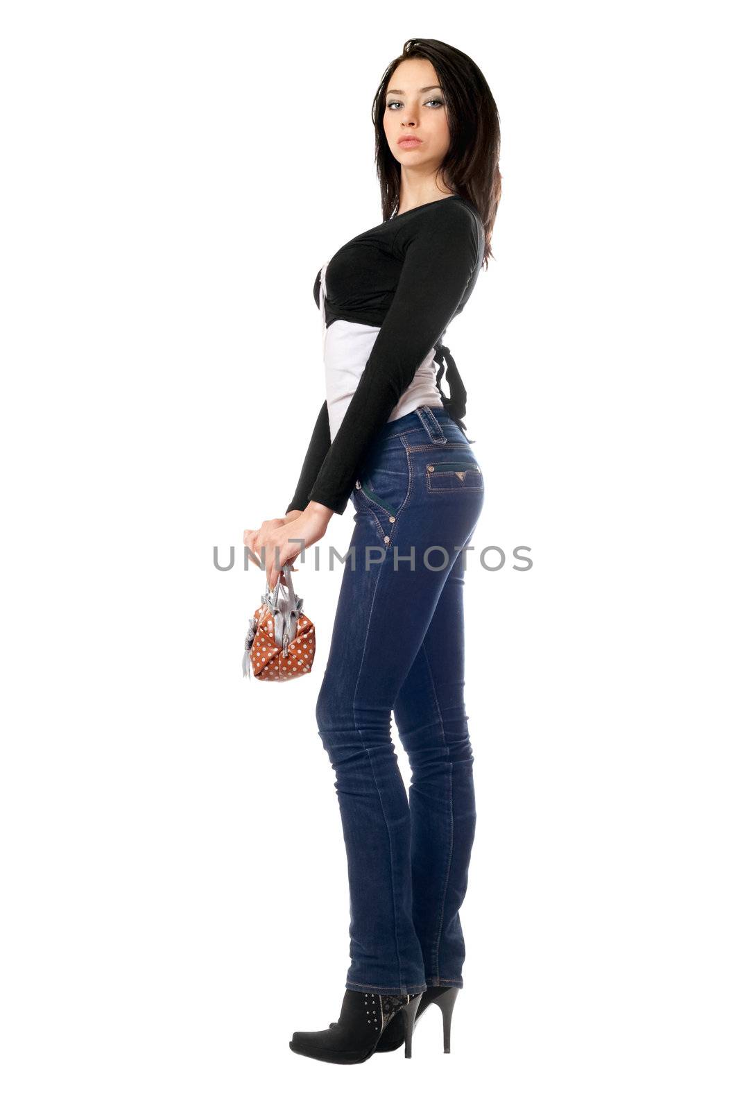 Pretty young brunette with a handbag. Isolated