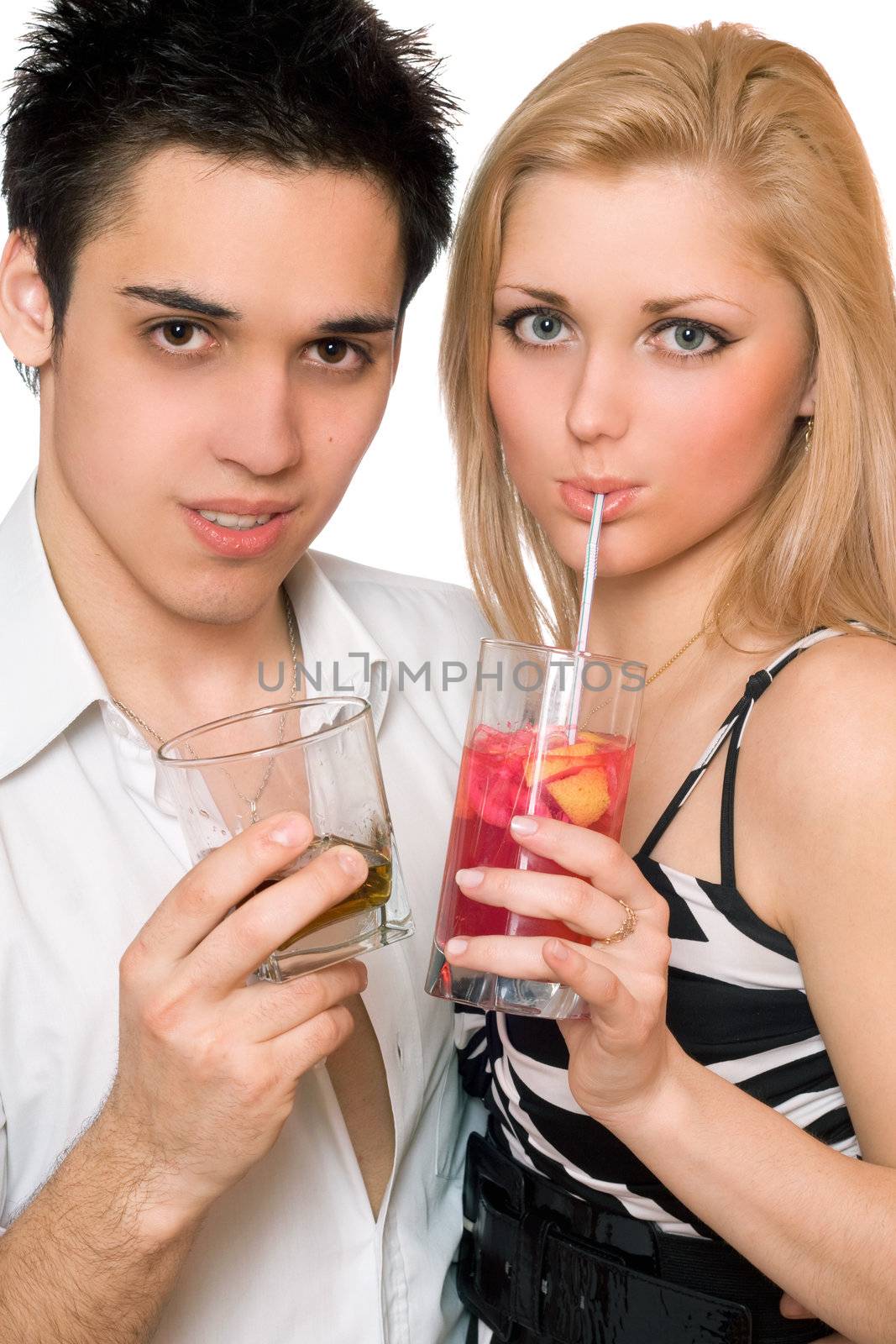 Happy young couple with cocktails. Isolated on white